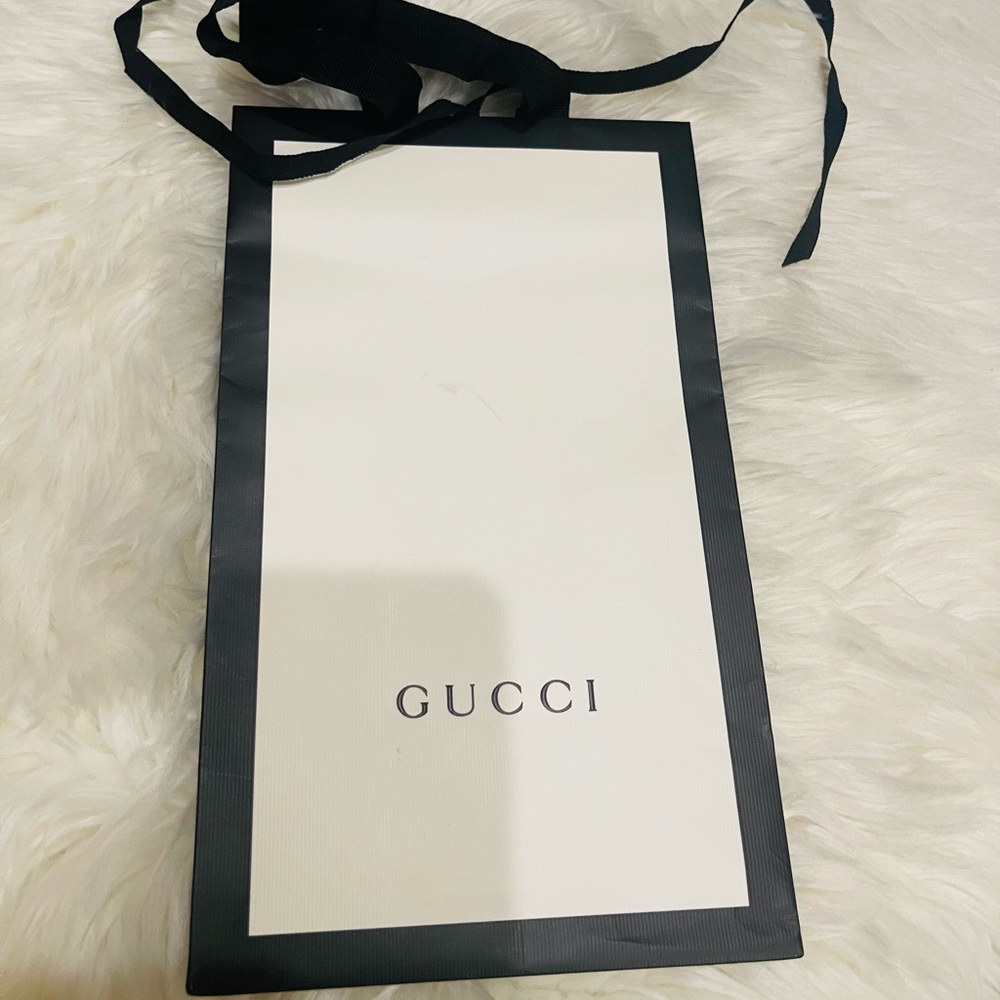 Vertical Gucci gift bag
